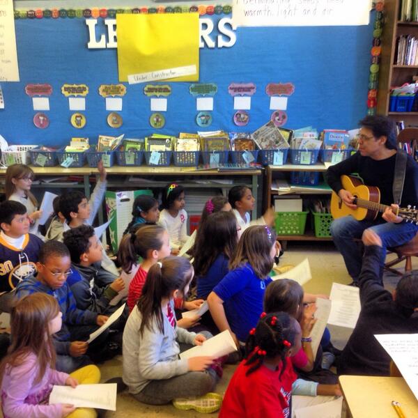 Kasim Sulton entertaining schoolchildren